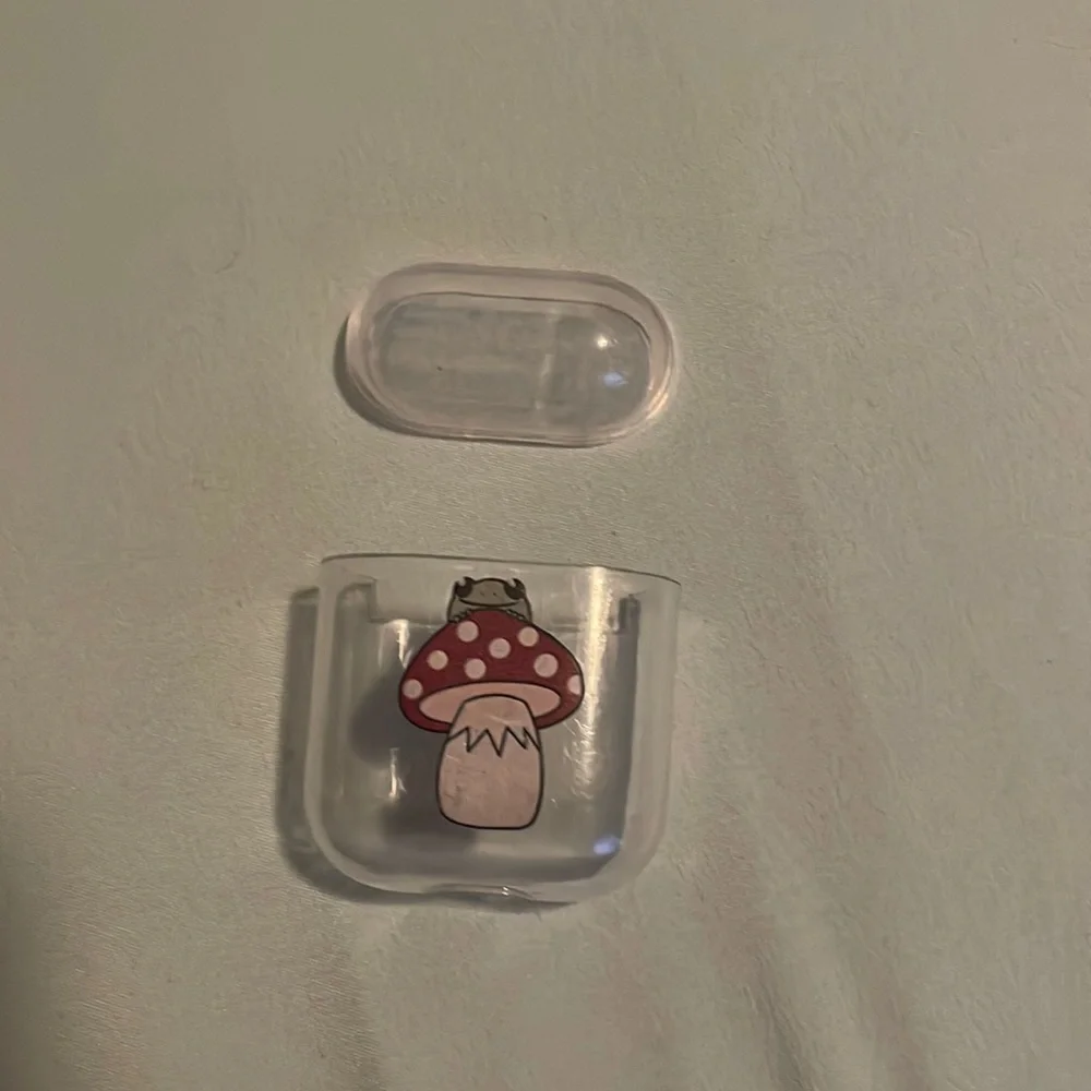 First generation frog and mushroom airpod case